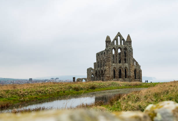 istock Historical Abbey on cliff top overlooking the North Sea 1350498596