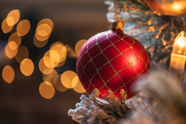 istock Christmas Tree Decorated With Gold and White Ornaments 1350505838