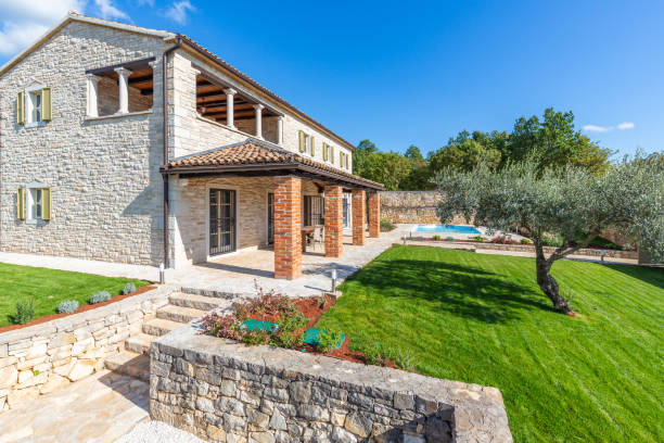 istock Luxurious beautiful modern villa with swimming pool and yard garden 1350512033