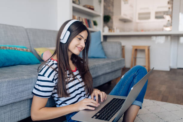 istock Girl studying online at home 1350512431