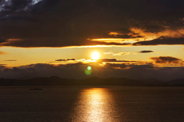 istock Seascape with a beautiful sunset over Avacha Bay in Kamchatka 1350514059