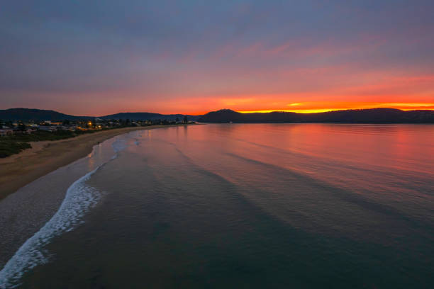 istock 100 percent cloud covered sky greets dawn at the seaside 1350520758