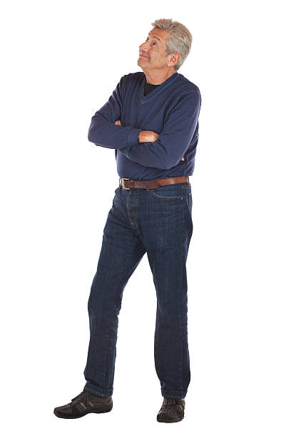 istock Senior man crosses arms and looks up 135052452