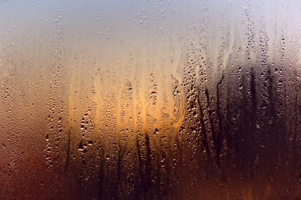 istock Water drops on a window, on a cold winter morning. 1350528940