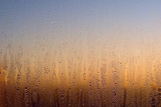 istock Water drops on a window, on a cold winter morning. 1350529116