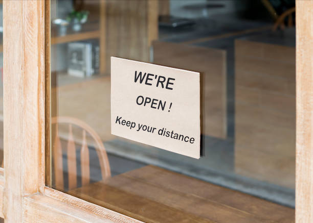 istock We are open keep distance during covid situation. 1350529136