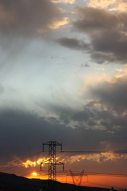 istock Electricity pylons at sunset 135053235