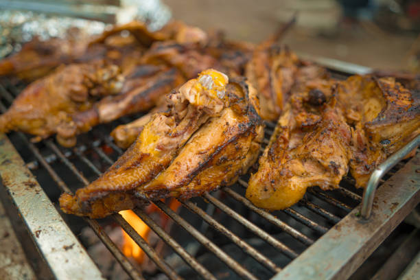 istock Assorted meat grilling over a BBQ outdoors 1350533061