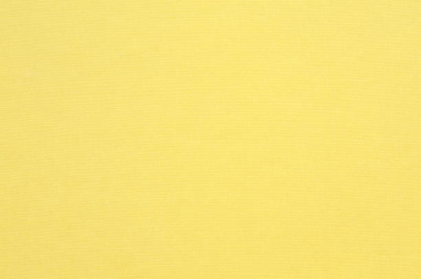 istock Natural yellow-dyed fabric texture backgroun 1350537403