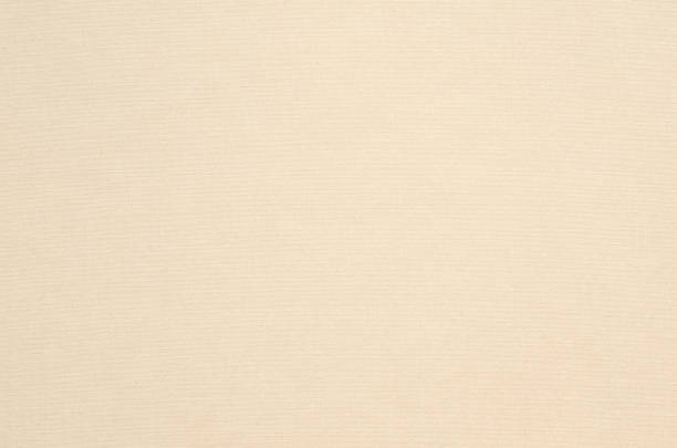 istock Natural beige-dyed fabric texture background 1350537405