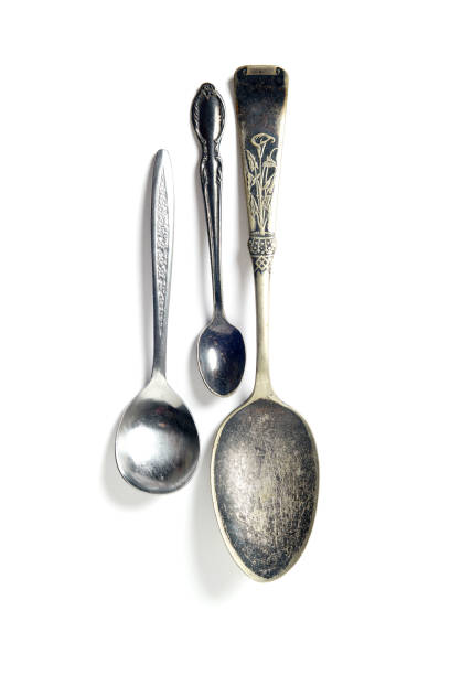 istock Antique Spoons Isolated on White Background 1350540734