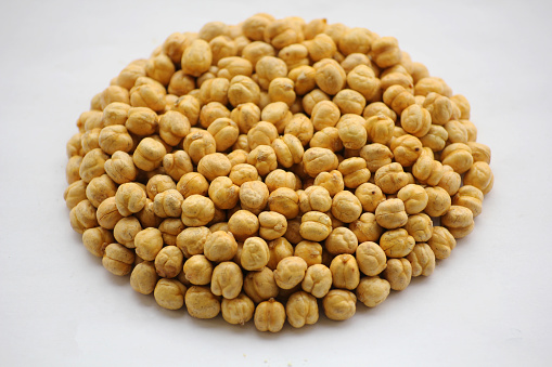 unsalted chickpeas on a white background