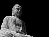istock 3d rendering of chinese stone bodhisattva in the dark background Chinese god 1350549946