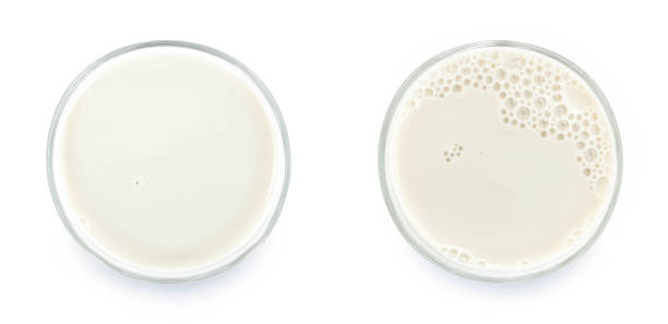 istock Glass of milk isolated on white background 1350551145