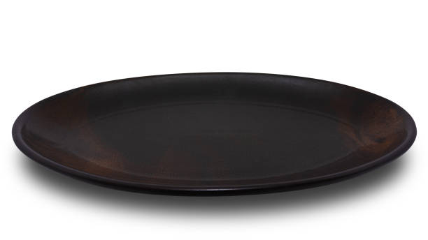 istock Brown circle ceramics plate isolated on white background. 1350551400
