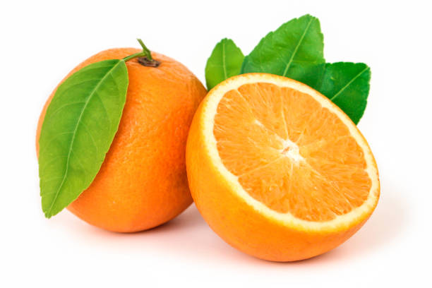 istock Orange fruit with orange slices isolated on white background. 1350553144
