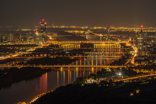 Vienna by Night Viewed From Above With Lights of the Skyline Reflecting in Danube River