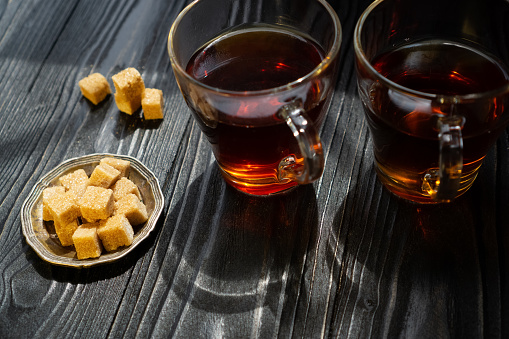 Invitation to a pleasant conversation over tea with cane sugar