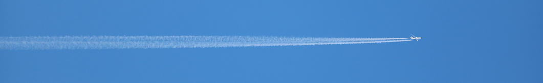 double track in the sky from a jet plane