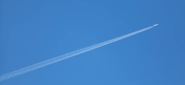 istock double track in the sky from a jet plane 1350559559