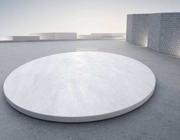 istock Empty concrete floor and round white podium. 1350560189