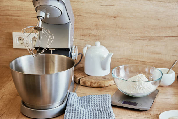 istock Preparing homemade cake. Electric mixer 1350560285