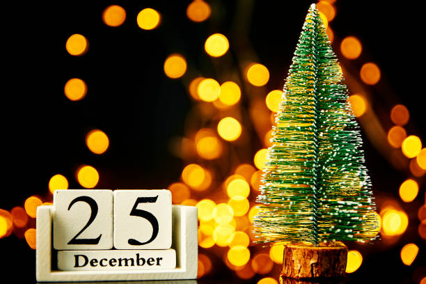 istock Merry Christmas and Happy New Year composition with christmas tree on dark background 1350560733