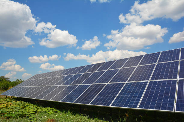 istock A large ground-mounted solar panel, an alternative energy resource is installed in the backyards of the house near a vegetable garden with pumpkins. 1350561325