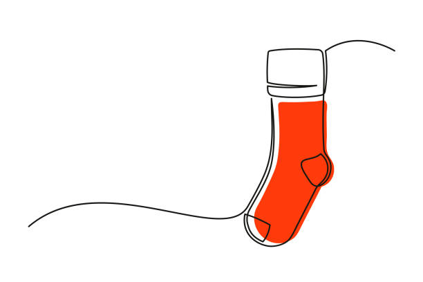 continuous one line drawing of christmas sock - santa hat stock illustrations