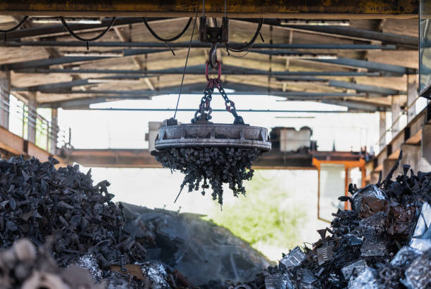 istock Transporting Scrap Steel By Crane, Recycling Of Material 1350566907