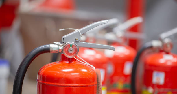 istock The red fire extinguisher is in the building for fire prevention and safety. 1350567163
