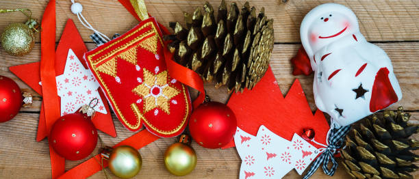 istock Christmas decorations on wooden background with advertising space 1350567780