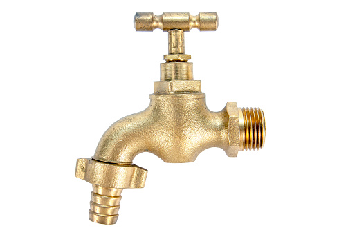 Vintage brass water faucet or tap isolated on white background. Antique bronze water valve isolated