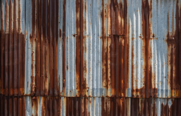 istock Rusted corrugated galvanised steel wall texture background 1350570942