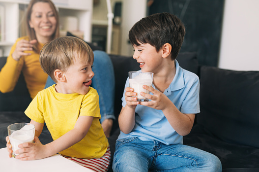 kids drinking milk at home