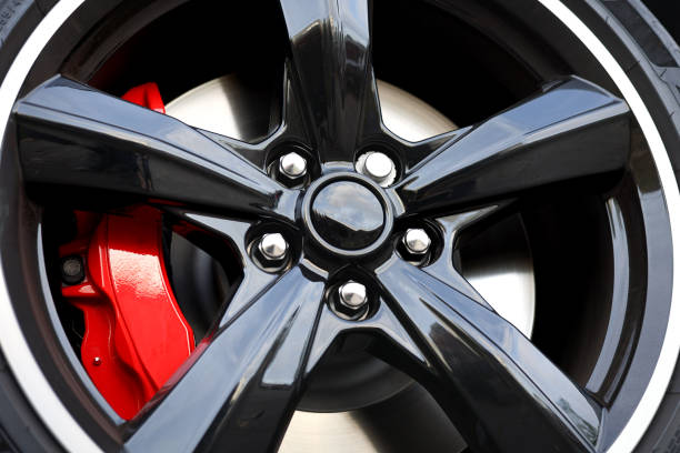 istock Modern black painted aluminum rim with red brake caliper 1350579519