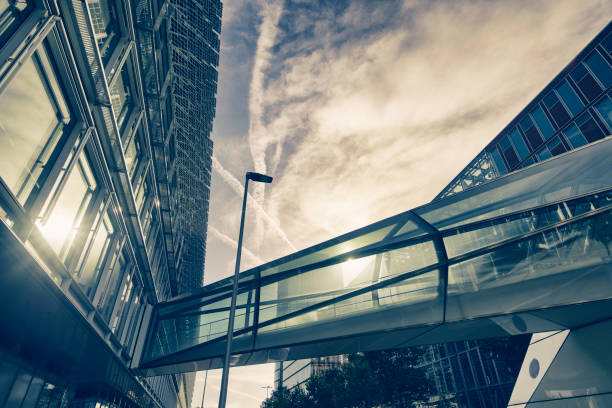 istock Directly below modern office buildings with bridge 1350579829