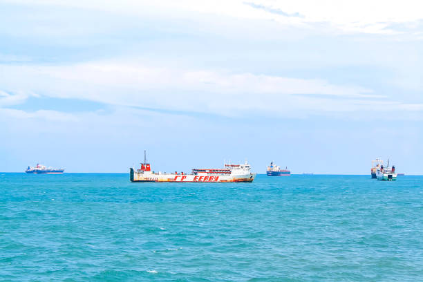 Sunda Strait, Indonesia - December 29, 2016: View from a group of ships sailing in the Sunda Strait, Indonesia.