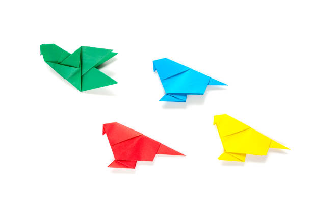 istock colorful origami paper parrotson white isolated background . children's creativity 1350581908