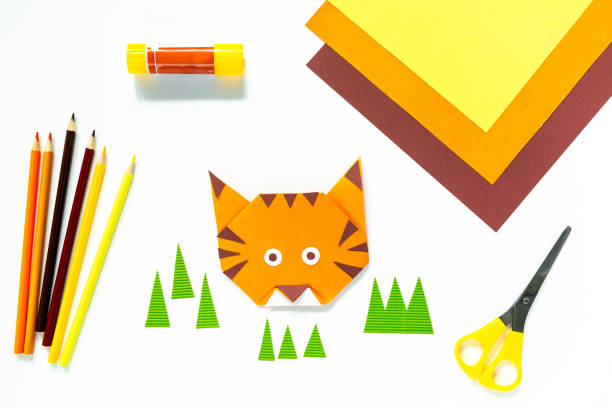 istock Instruction step by step origami tiger. Children's craft 1350582086