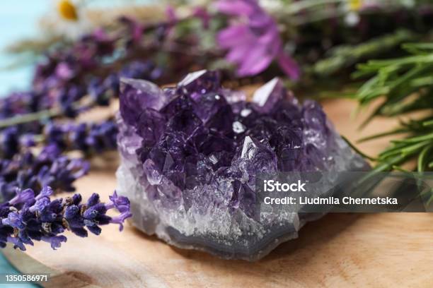Amethyst And Healing Herbs On Wooden Board Closeup Stock Photo - Download Image Now