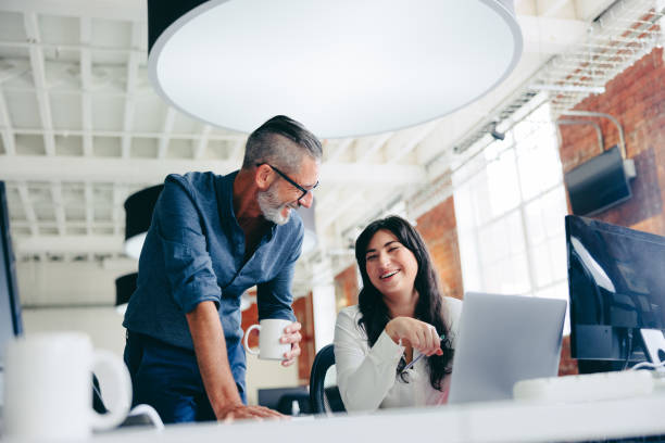 istock Successful businesspeople working together in an office 1350589246