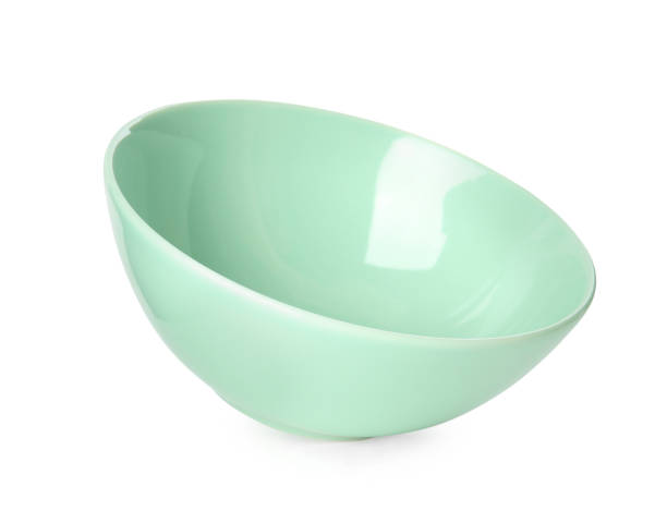 istock Clean light green bowl isolated on white 1350590449