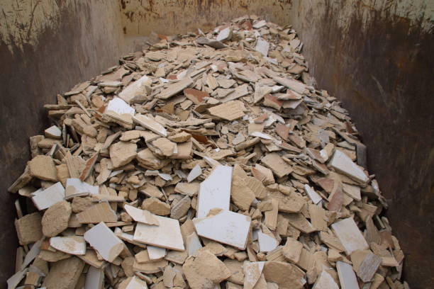 istock Tile remnants stored as construction rubble in a container for collection 1350595920