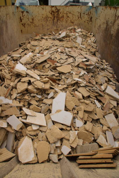 istock Tile remnants stored as construction rubble in a container for collection 1350595924