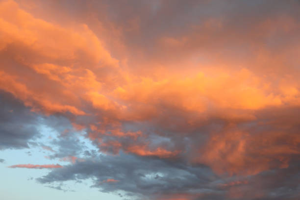 istock romantic sky with red and orange colored clouds from the setting sun 1350597400