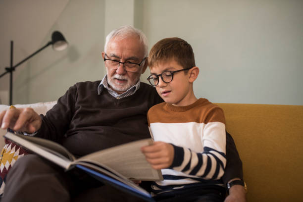 istock Senior man explaining the lesson to his grandson 1350597849