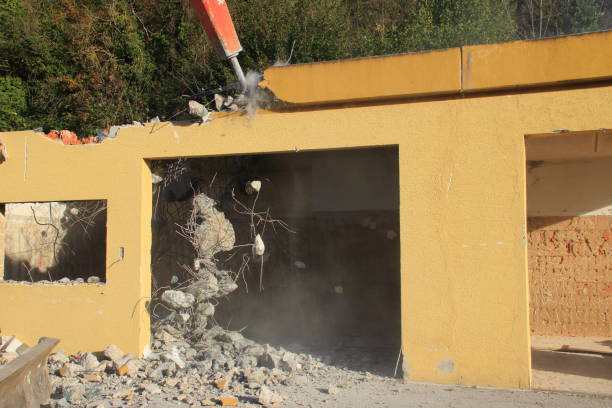 istock Demolition of a ceiling with a large chisel 1350599444