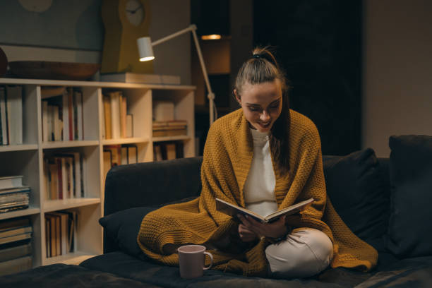 istock woman at home. night scene 1350602433