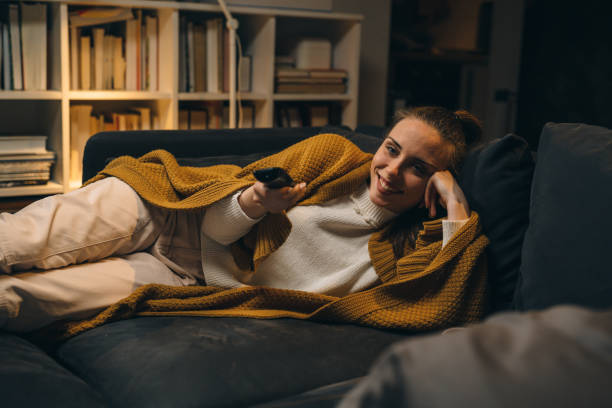 istock woman at home. night scene 1350602457